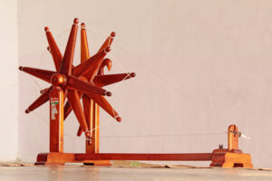 Image credit: Jigar Brahmbhatt on Wikimedia Commons (https://commons.wikimedia.org/wiki/File:Charkha_kept_at_Gandhi_Ashram.jpg); License: CC BY-SA 3.0 (https://creativecommons.org/licenses/by-sa/3.0/deed.en)