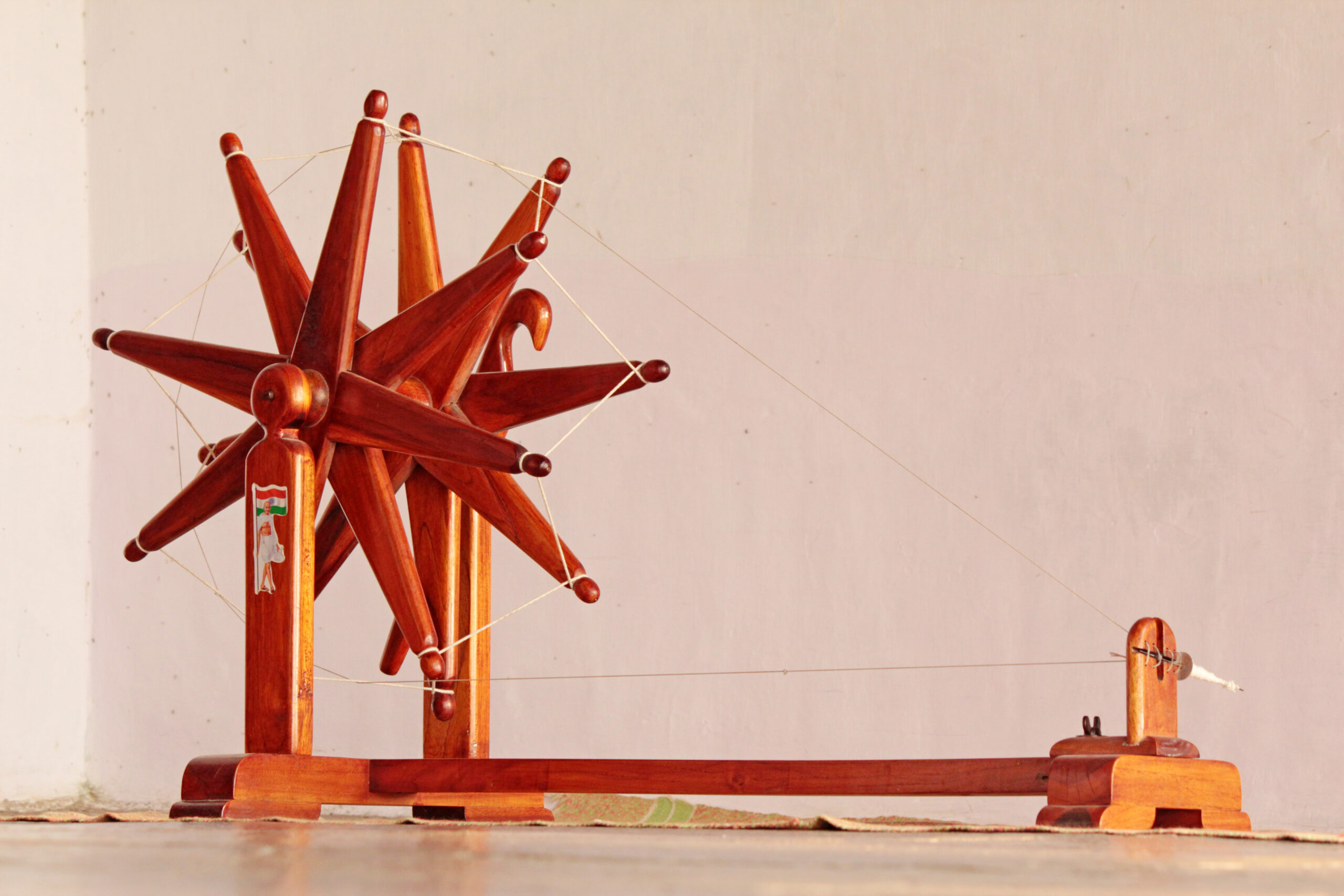Image credit: Jigar Brahmbhatt on Wikimedia Commons (https://commons.wikimedia.org/wiki/File:Charkha_kept_at_Gandhi_Ashram.jpg); License: CC BY-SA 3.0 (https://creativecommons.org/licenses/by-sa/3.0/deed.en)